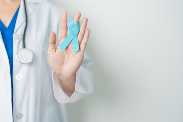 Blue November Prostate Cancer Awareness month, Doctor with Blue Ribbon in hospital for support...
