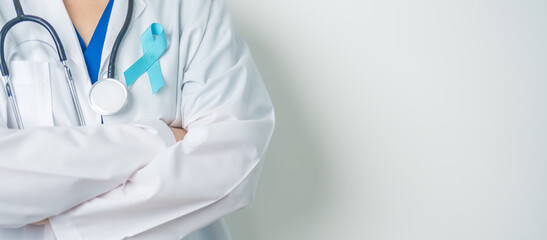 Blue November Prostate Cancer Awareness month, Doctor with Blue Ribbon in hospital for support...