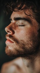 Obraz premium Serene Man in Meditation: Close-up Portrait of Peaceful Contemplation. Cultural and Spiritual Practices for Relaxation and Mindfulness. Ideal for Wellness Marketing, Meditation Apps, and High-Resoluti