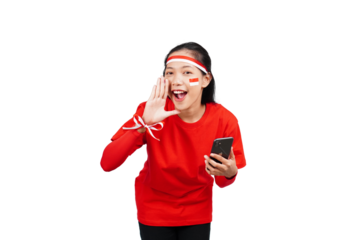 An Indonesian woman celebrating Indonesia's independence day on 17 August while holding smartphone with blank screen isolated transparent