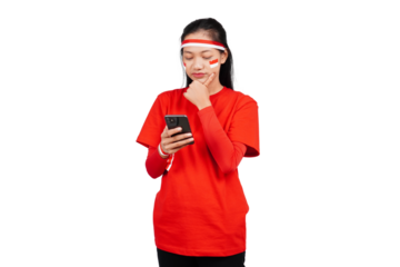 An Indonesian woman celebrating Indonesia's independence day on 17 August while holding smartphone with blank screen isolated transparent