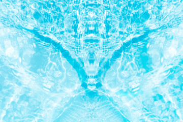 Blue water with ripples on the surface. Defocus blurred transparent blue colored clear calm water surface texture with splashes and bubbles. Water waves with shining pattern texture background.