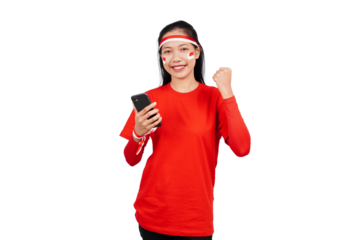 An Indonesian woman celebrating Indonesia's independence day on 17 August while holding smartphone with blank screen isolated transparent
