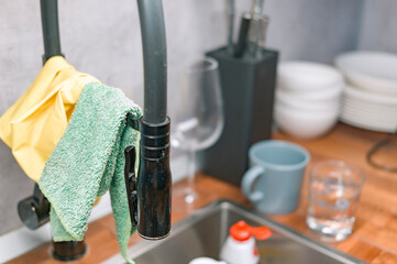 kitchen towels on the tap