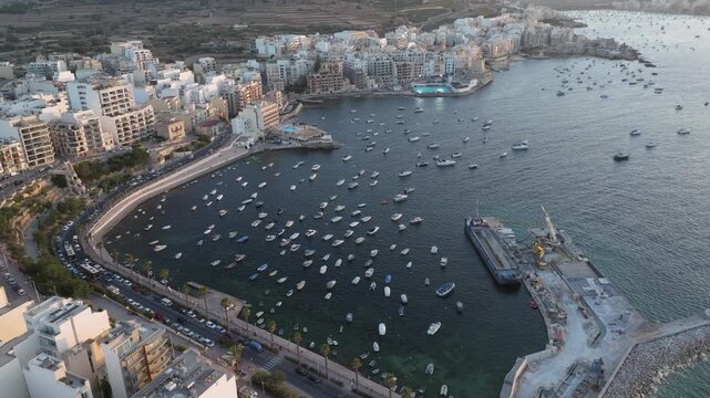 Aerial View Of Bugibba Waterfront Town And Resort On St Paul's Bay Near Qawra In Malta.