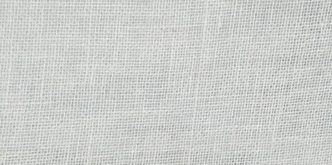 Beige jute texture background. Fragment of smooth brown linen tissue. Top view, flat lay, natural textile background and texture.