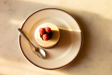 dessert with raspberries, tart on a plate