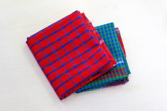 Multicolored checked design gamcha or cotton towels. It is traditional cloth of Indian subcontinent, Bangladesh, and Nepal which is also known as Gamchha, Gamucha, Gamusa, Gamsa, and Angochha.