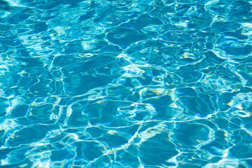 Pool water background, blue wave abstract or rippled water texture background.