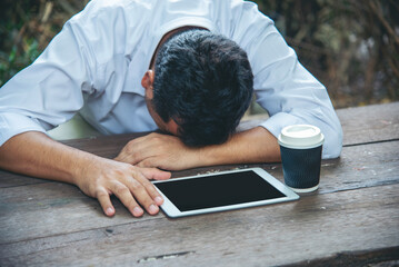 Failure businessman stress bankruptcy man sitting wood desk feeling nagative depression have...