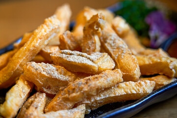 A plate of crispy and delicious Taiwanese snacks, sweet and spicy