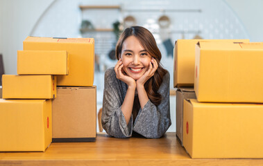 Portrait of owner asian woman freelancer sme business online shopping working checklist order and packing product, cardboard box, E-commerce, marketing, entrepreneur, Business online, startup concept