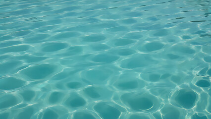 Fototapeta premium Calm turquoise water with gentle ripples and reflection evoking a serene and refreshing atmosphere