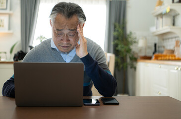 Senior businessman working from home with emotion and postures