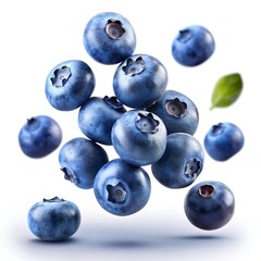 Close-up of fresh blueberries floating against a white background