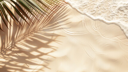 Obraz premium Summer beach landscape with shadows of coconut palm leaves over sandy beach with waves crashing. Summer vacation, travel background. Copy space. Top view. Aerial view.