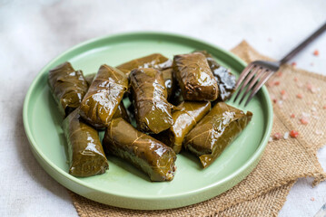 Delicious dolmades , grape leaves stuffed with rice .Greek cuisine 