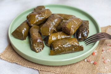 Delicious dolmades , grape leaves stuffed with rice .Greek cuisine 