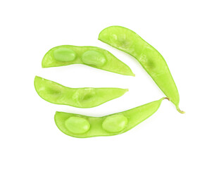 Raw green edamame pods with soybeans isolated on white, top view