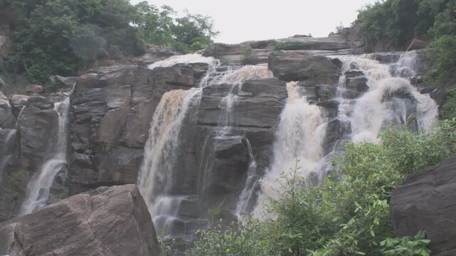 "jonha falls" also called "gautamdhara fall", a "hanging valley" type waterfall surrounded by lash green forest and rocky wilderness in the water course of "radu river", ranchi, jharkhand, india