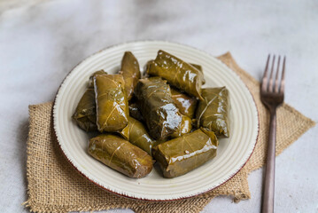Delicious dolmades , grape leaves stuffed with rice .Greek cuisine 