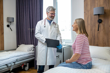 Blonde female patient having consultation with the doctor