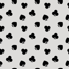 Pattern of playing card suits in modern style on gray background. Abstract vector illustration graphic design.
