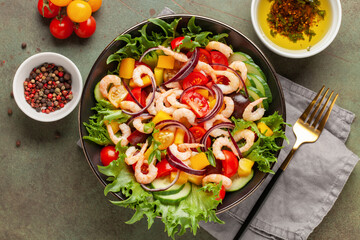 Easy  salad of fresh cucumber, tomato, sweet pepper, shrimps and onion . Healthy food. Top view