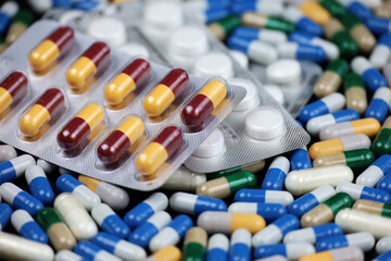 Variation of pills in capsules and tablets. Horizontal background for pharmacy, antibiotics, vitamins