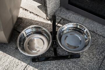 bowl of drinking water for dogs in public facilities - caring for animals in cities