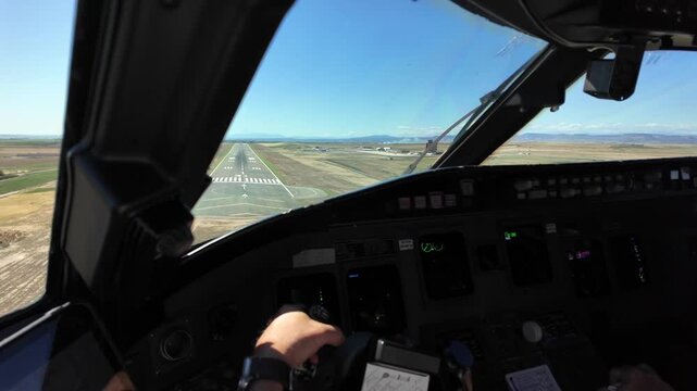 Immersive pilot POV in real time landing at Lleida airport in Spain, in a sunny summer day with a blue unclouded sky. 4K 60FPS