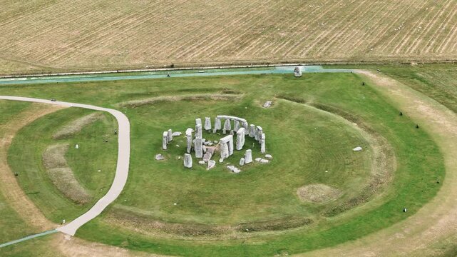Stonehenge iconic prehistoric megalithic structure in Wiltshire, England, aerial orbiting shot