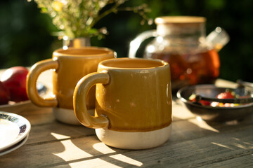  Summer tea party outdoors. Morning breakfast in fresh air.
