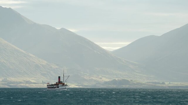 Late afternoon shot of TSS Earnslaw crossing Lake Whakatipu with pastel colours B