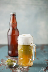 Boozy Refresing Cold Matcha Beer in a Pint Glass  on the table.