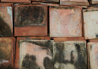 Old roof tiles background. Ancient roof tiles.