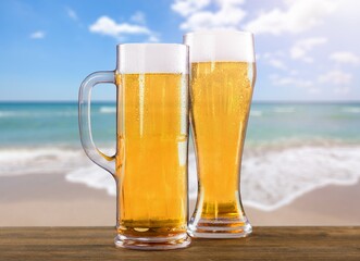 glasses of light tasty alcohol chilled beer