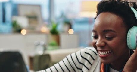 Remote work, black woman and dance in home for music, happy or achievement in sale. Freelancer, musician or excited in lounge with headphones, album release or positive feedback on streaming platform