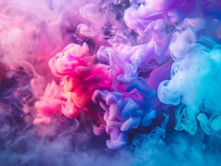 Fototapeta premium Abstract colorful smoke swirls in pink, blue, and purple hues.