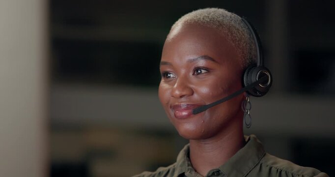 Computer, customer service and headset with woman in support office at night for consulting or feedback. Business, call center and sales representative with African agent at helpdesk in workplace