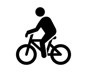 silhouette of a person riding a bike