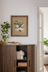 Stylish interior with a wooden cabinet adorned with potted plants, decorative objects, and books. A...