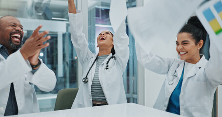 Happy people, doctor and team with paperwork in celebration for done, success or finished at hospital. Group of excited medical employees with smile or documents in air for winning together at clinic