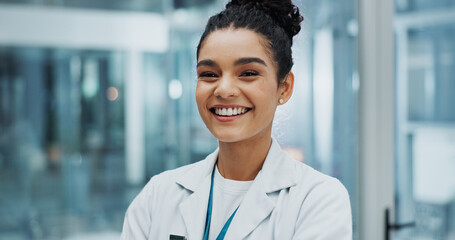 Doctor, portrait and happy in hospital for healthcare, wellness and professional medical service....