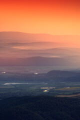 colorful sunset sky over hills