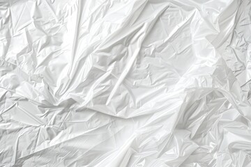 Wrinkled plastic wrap texture on a white background