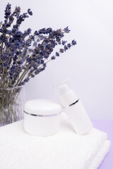 Container for cream, shampoo, toiletries, spa. Unbranded white plastic bottles. Bottle with a dispenser for cosmetic products. Skin care and beauty concept. Mockup style, copy space 