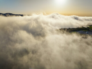 Aerial view of sunset above clouds at Fanal mountain, Madeira island, Portugal