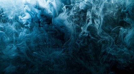 Obraz premium Abstract blue ink swirling in water, creating a mesmerizing, ethereal pattern.