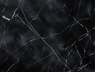 Black marble texture with white veins, abstract background.